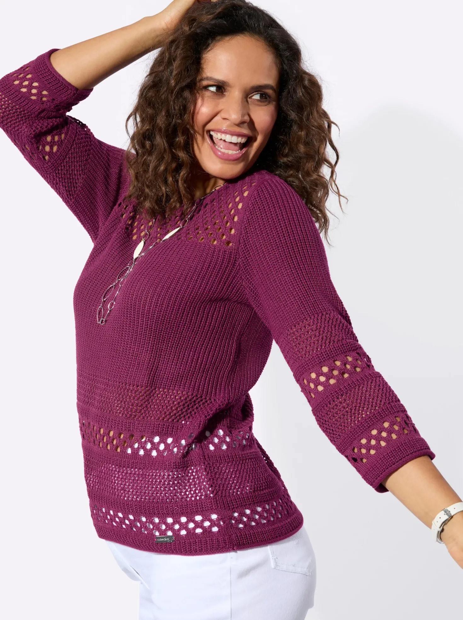 Ajourpullover mit Rollkanten