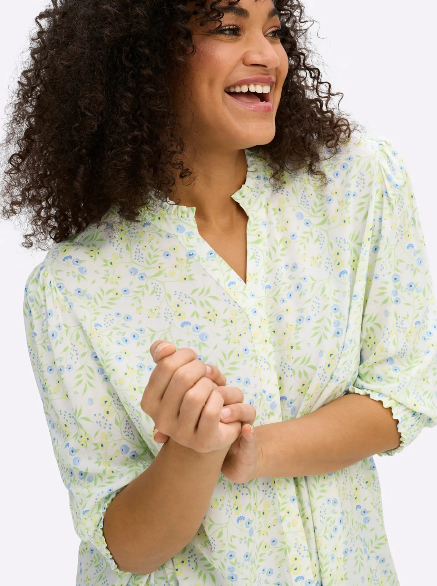 Bluse mit Stehkragen und Smokbund am Ärmel
