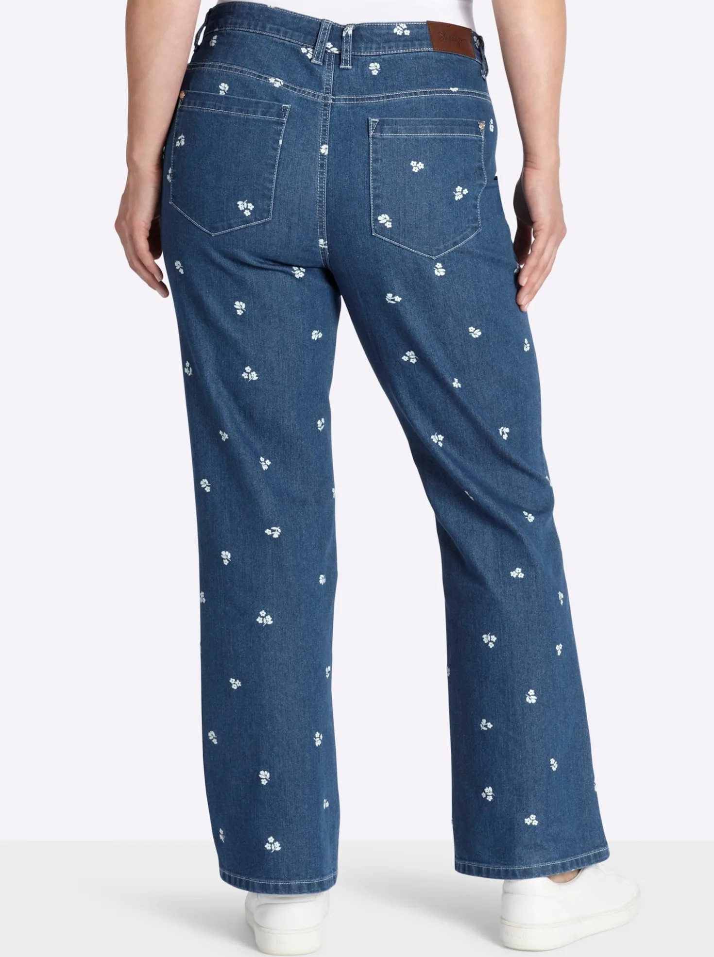 Bootcut-Jeans mit Blumen-Alloverprint