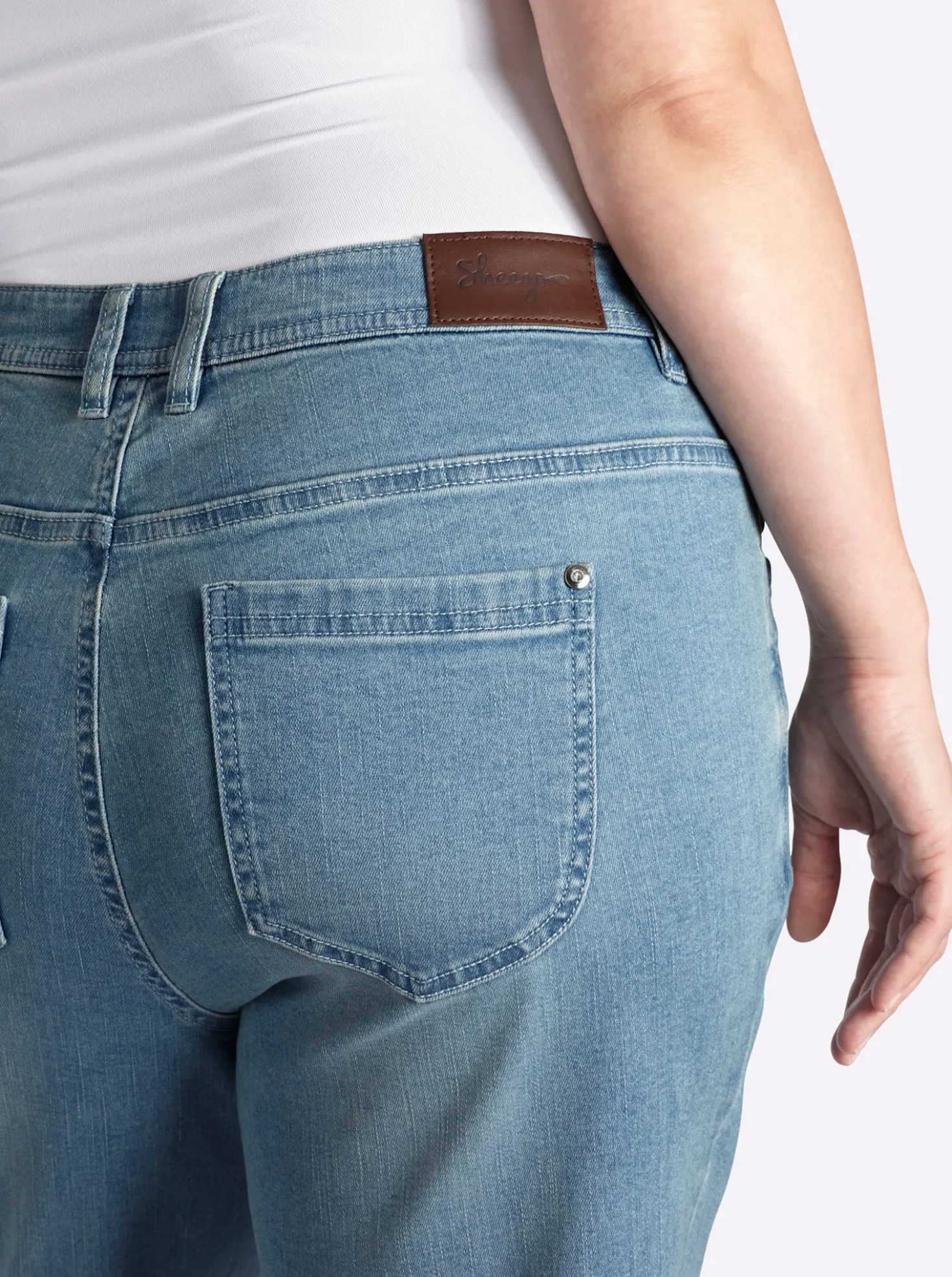 Bootcut-Jeans mit Fransensaum