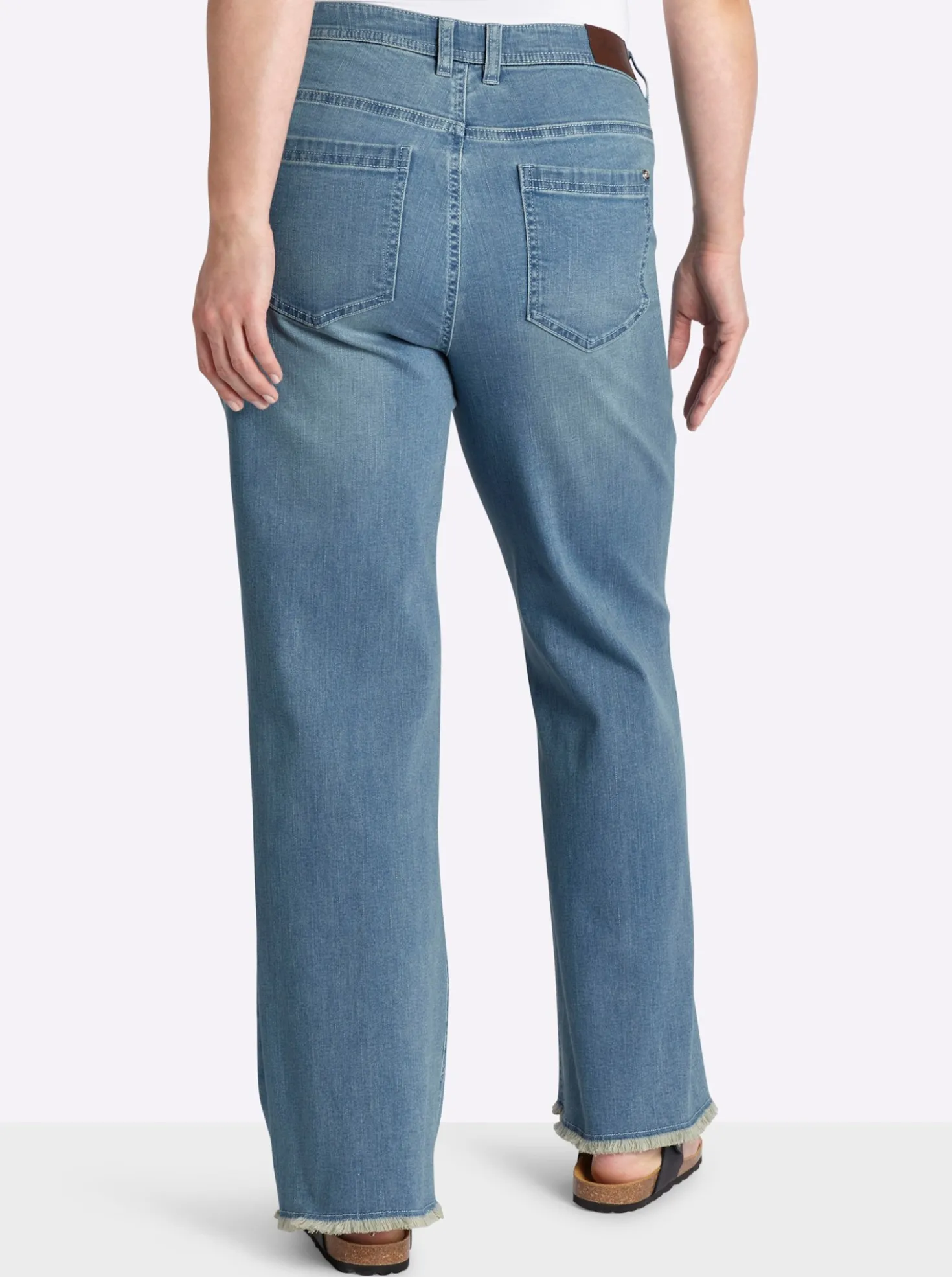 Bootcut-Jeans mit Fransensaum