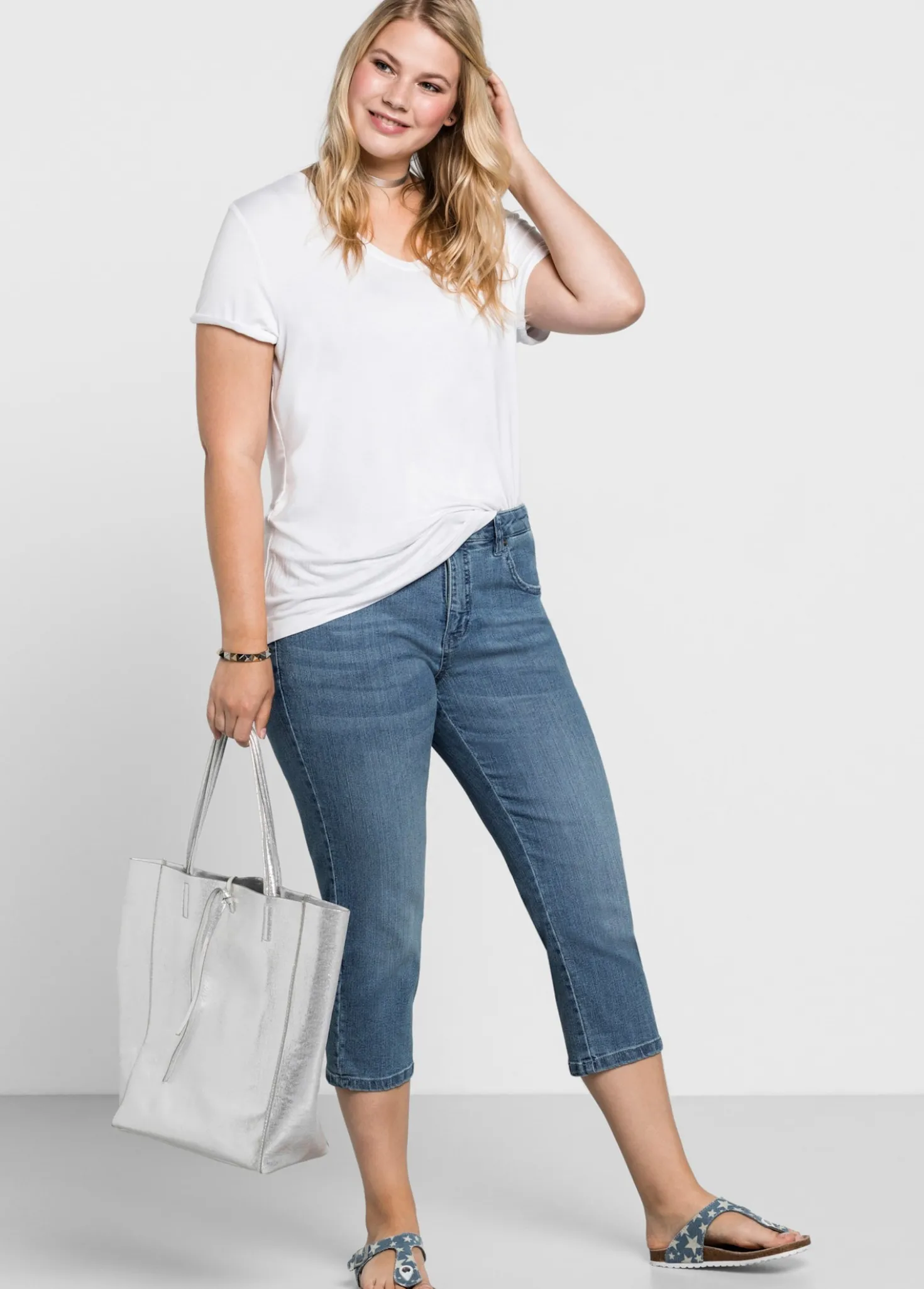 Caprijeans mit Krempelfunktion