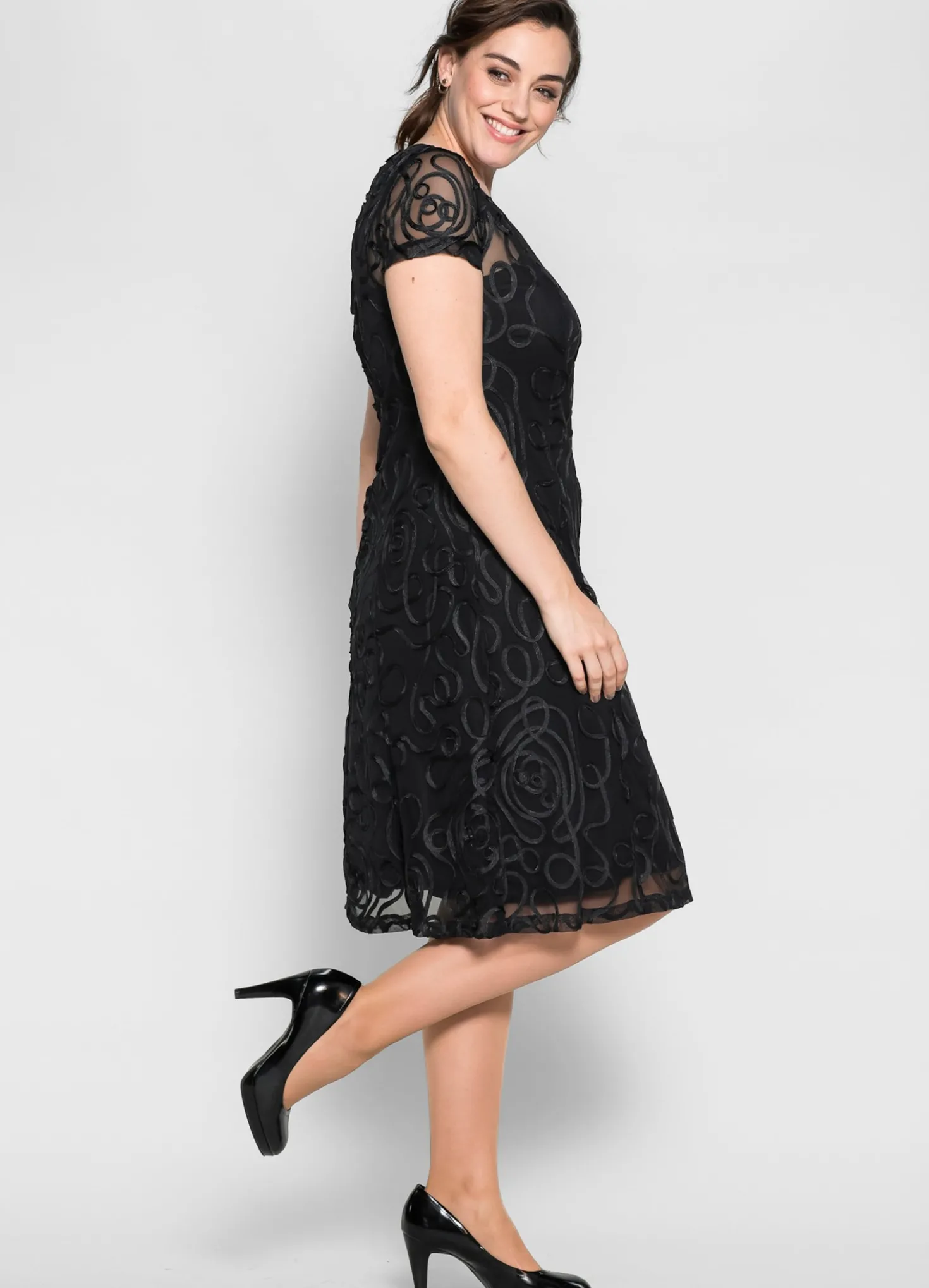 Cocktailkleid mit Zierborten