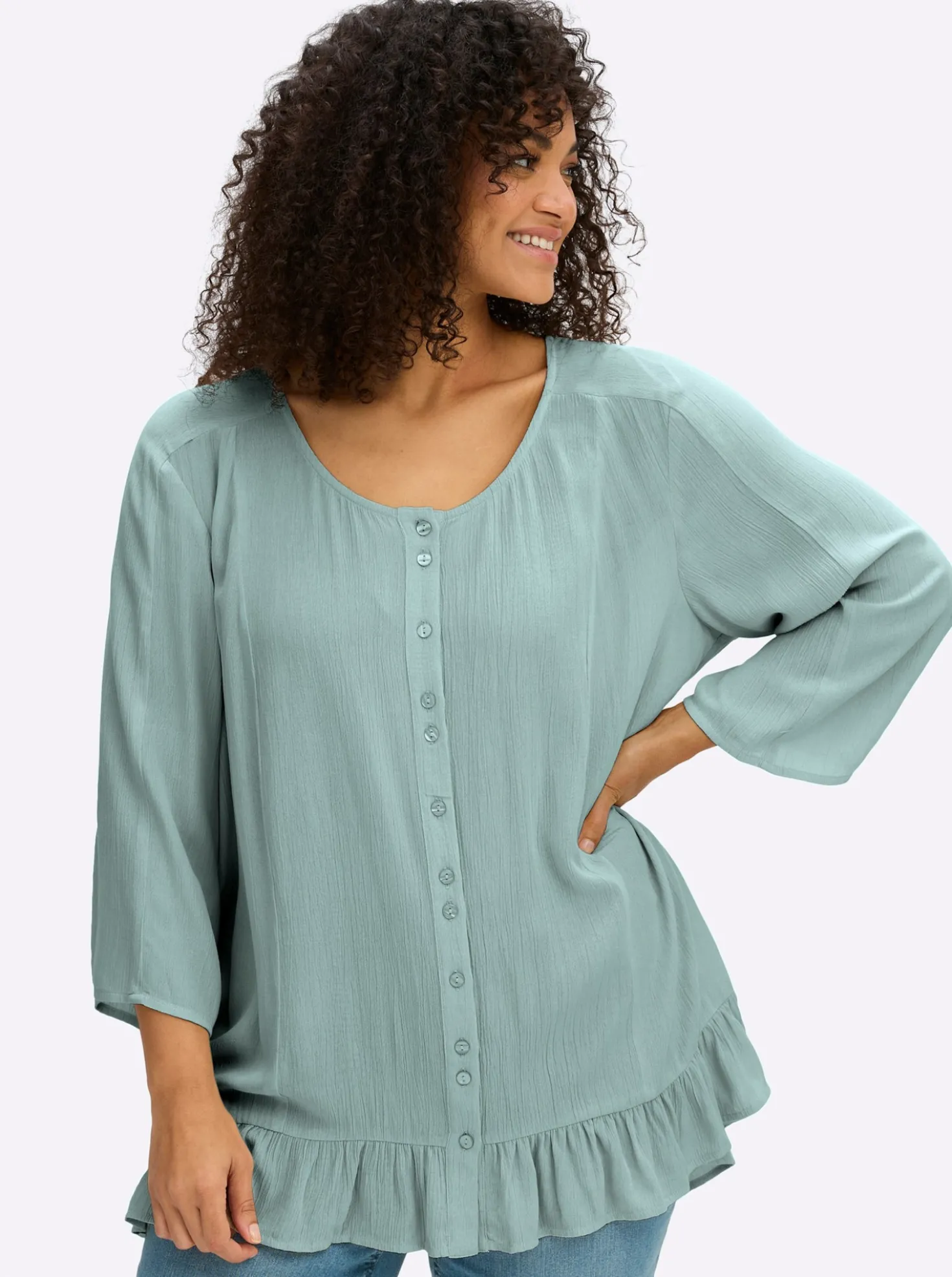 Crinklebluse mit Volant am Saum