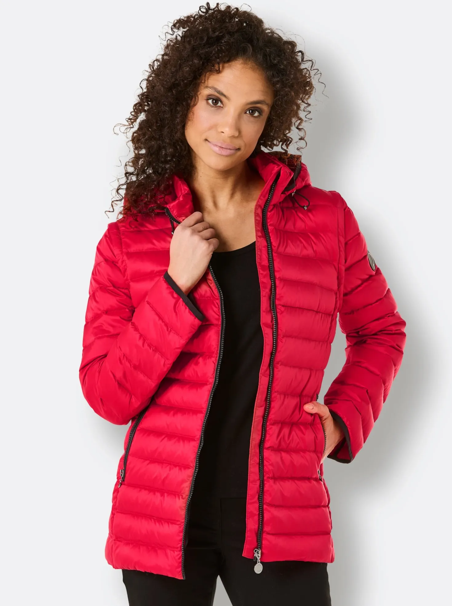 Daunenjacke als Jacke und Weste tragbar