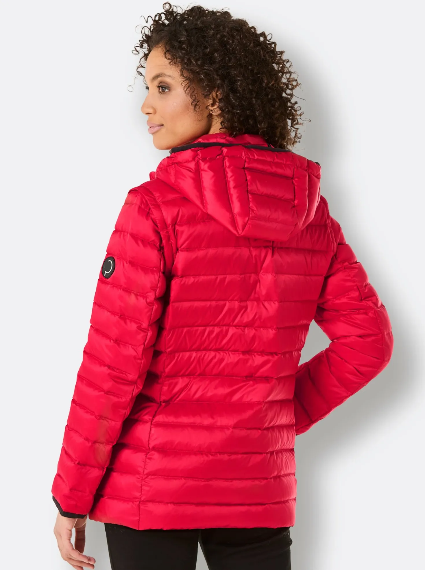 Daunenjacke als Jacke und Weste tragbar