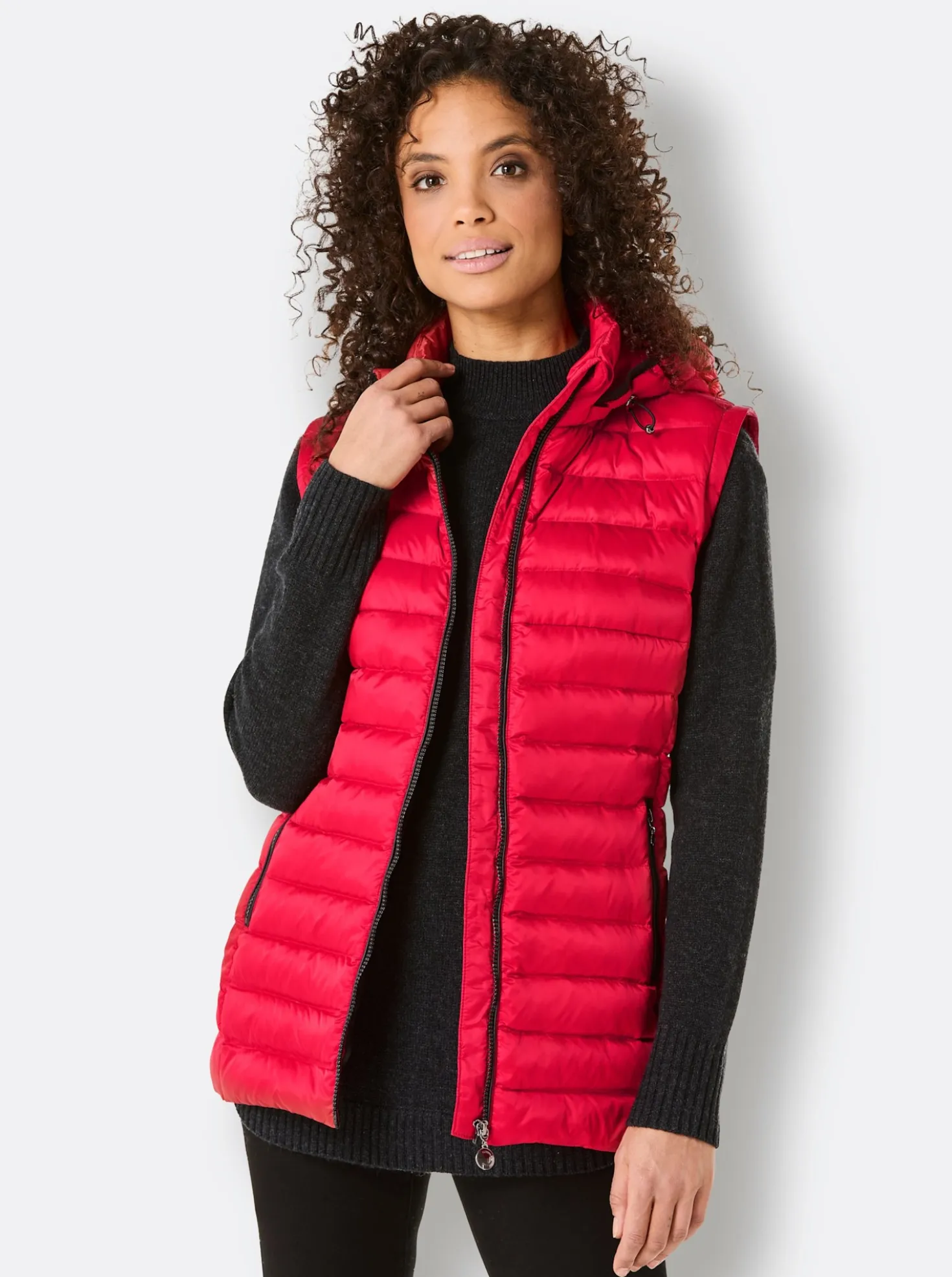 Daunenjacke als Jacke und Weste tragbar