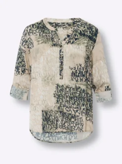 Druckbluse , hinten modisch länger geschnitten
