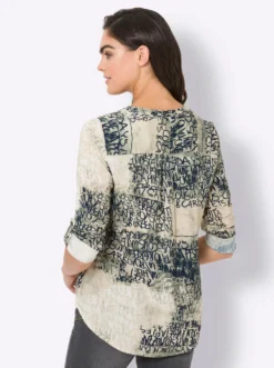 Druckbluse , hinten modisch länger geschnitten