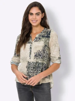 Druckbluse , hinten modisch länger geschnitten