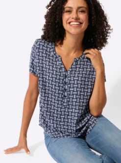 Druckbluse mit abgerundetem Saum