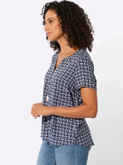 Druckbluse mit abgerundetem Saum