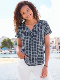 Druckbluse mit abgerundetem Saum