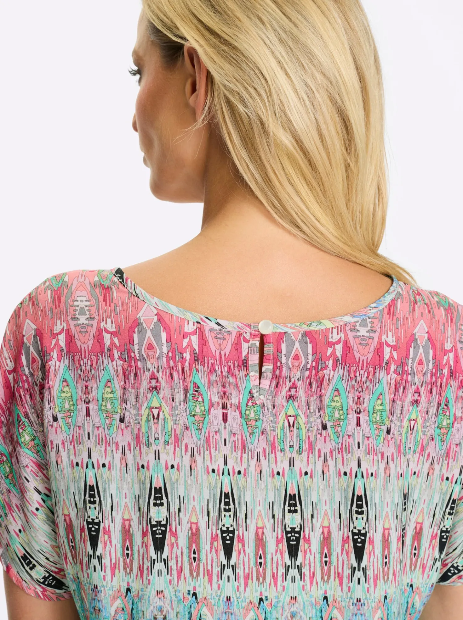 Druckbluse mit überschnittener Schulter