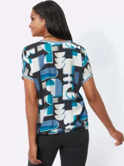 Druckbluse mit gestreiften Bündchen