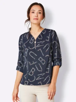 Druckbluse mit Lettering- und Leo-Dessin