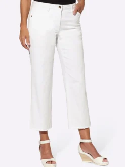 7/8-Jeans mit Fransen am Abschluss