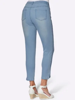 7/8-Jeans mit Glitzersteinchen an den Beinschlitzen
