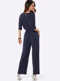 Jumpsuit mit Spitze am V-Ausschnitt
