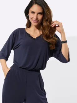 Jumpsuit mit Spitze am V-Ausschnitt