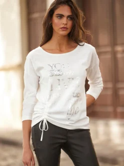 Langarmshirt mit Pailletten und Spitze