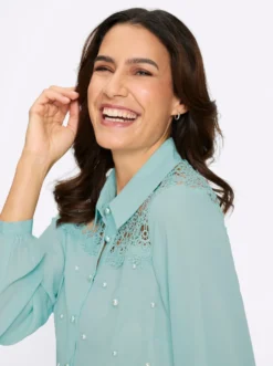 Longbluse mit Spitze und Zierperlen