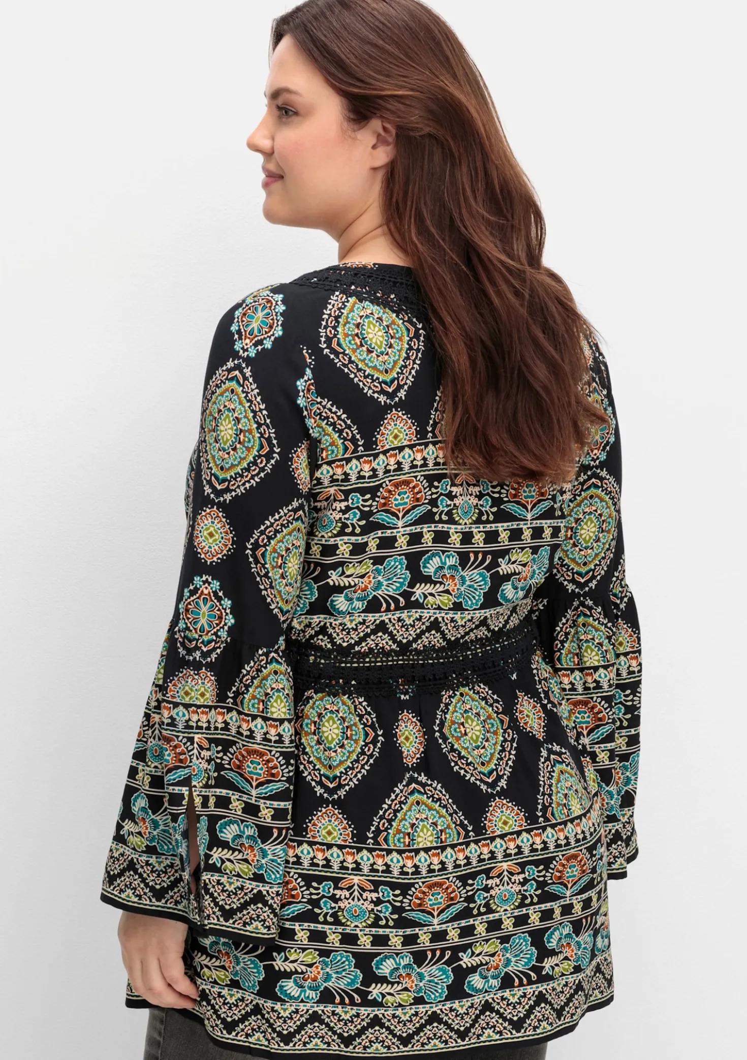 Longbluse mit Trompetenärmeln