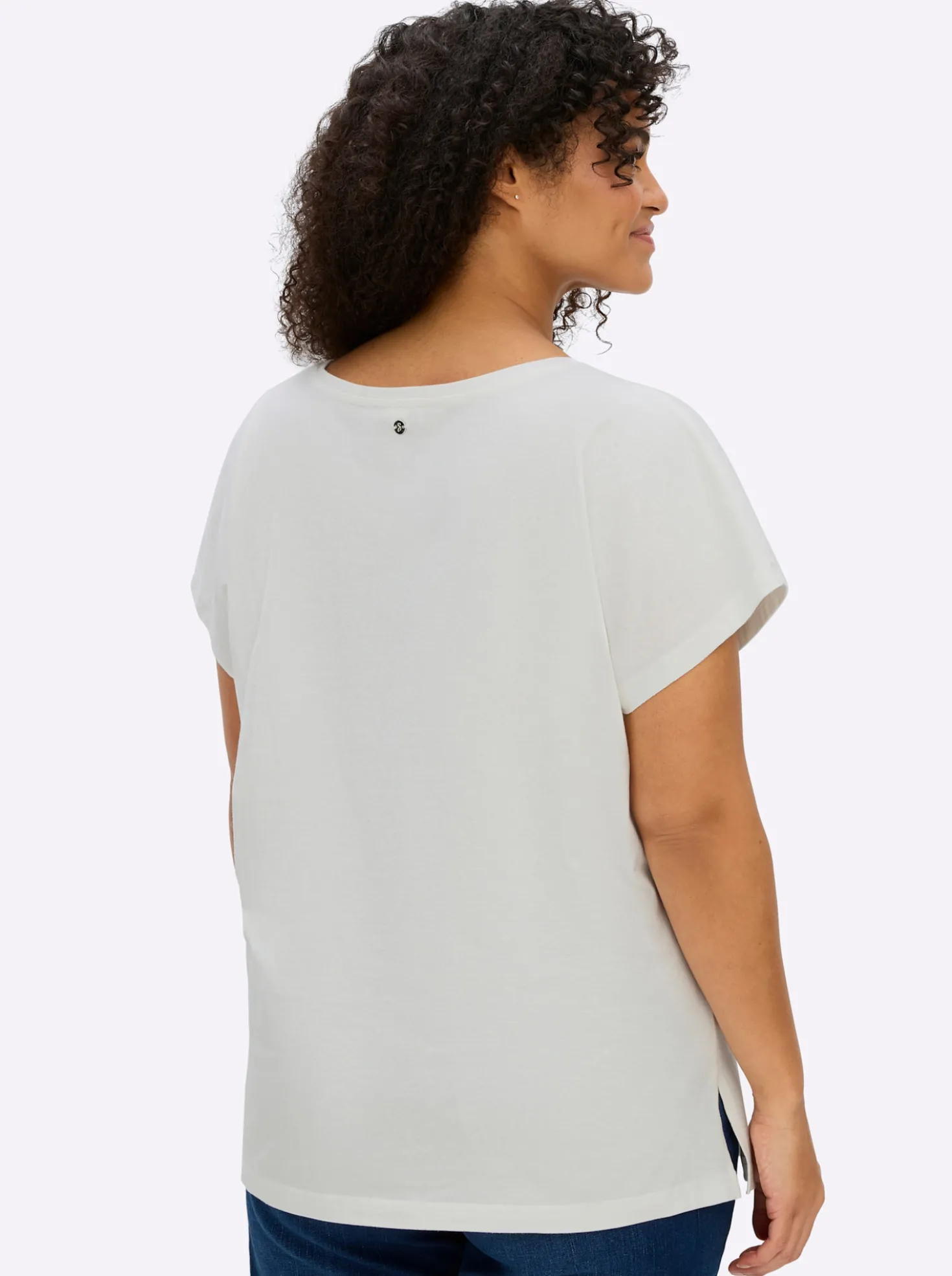 Rundhalsshirt mit Blütenprint am Saum