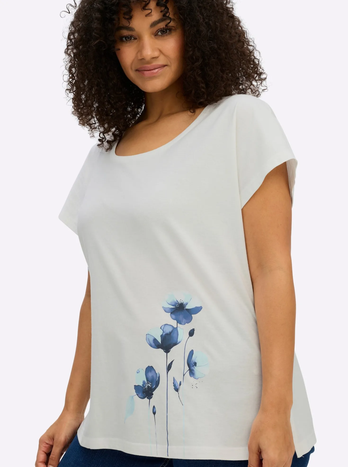 Rundhalsshirt mit Blütenprint am Saum