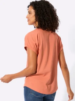 Rundhalsshirt mit Knopfleiste