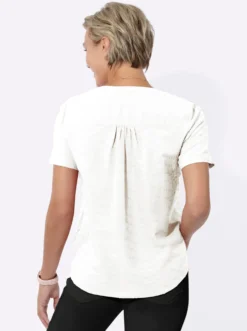 Schlupf-Bluse mit Schulterpasse, vorne und hinten.
