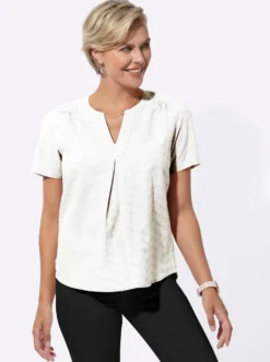 Schlupf-Bluse mit Schulterpasse, vorne und hinten.