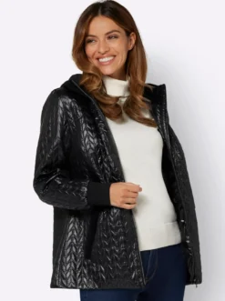 Steppjacke mit Details aus Samt