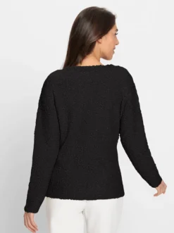 Strickjacke mit leichten Schulterpolstern