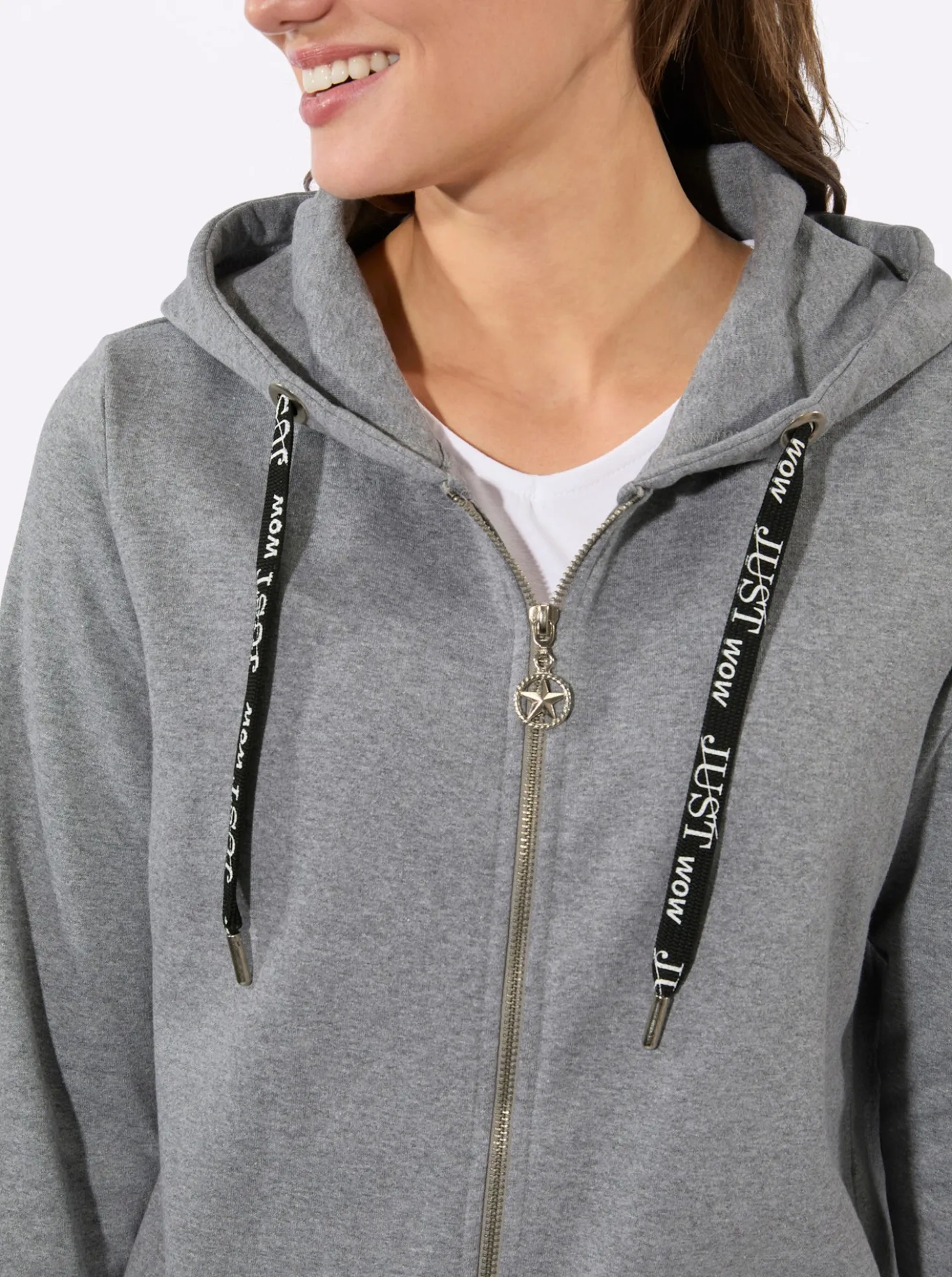Sweatjacke mit Glitzer-Applikation hinten