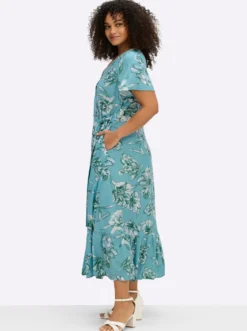 Wickelkleid mit Volant am Saum